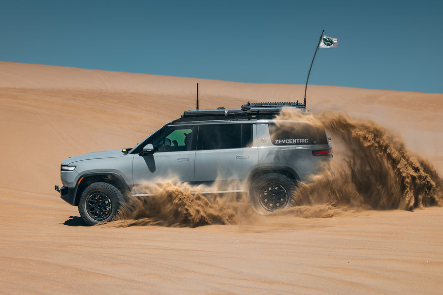 ZEVcentric Rivian R1S driving in the dunes