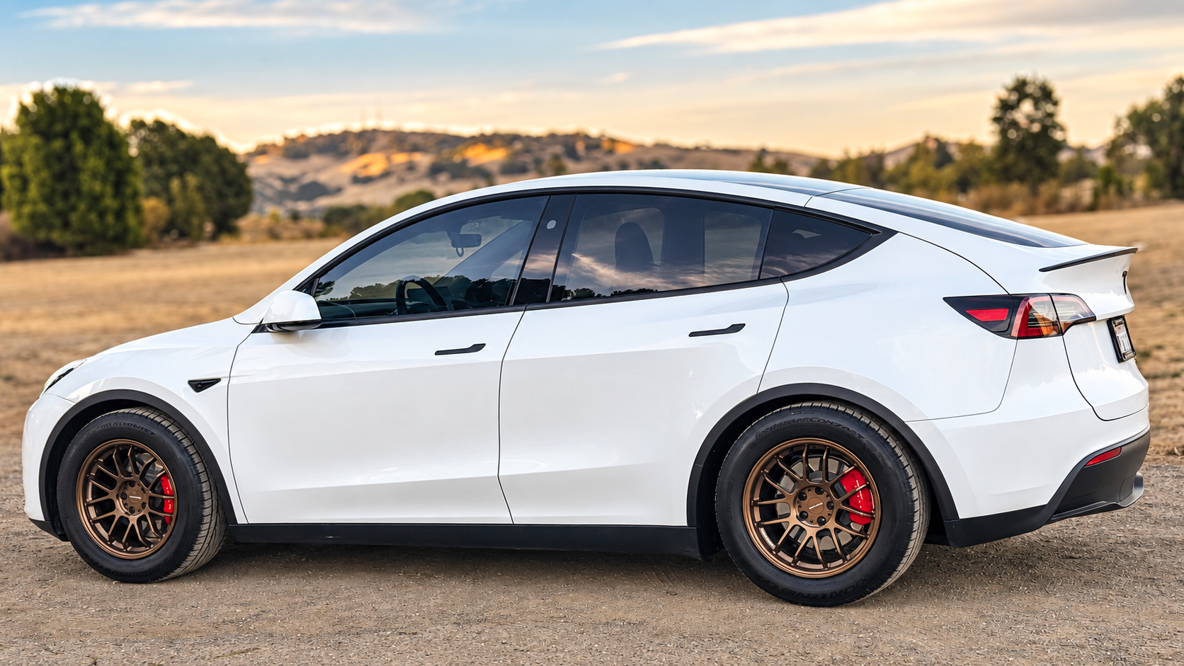 ASPIRA AF-M 18-inch Dark Bronze wheels on white Tesla Model Y side view