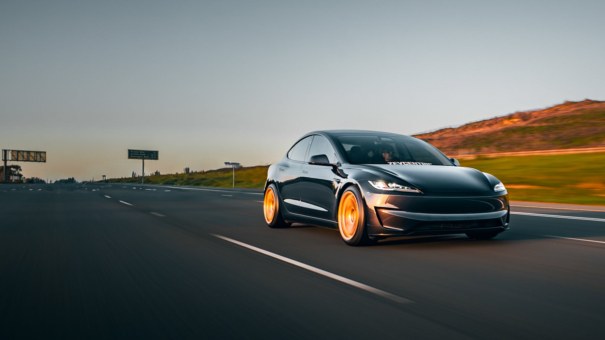 ZEVcentric Tesla Model 3 in motion